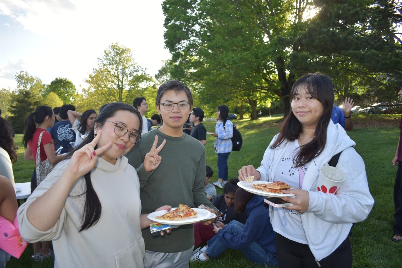 SASE members hanging out with pizza at an outdoor social